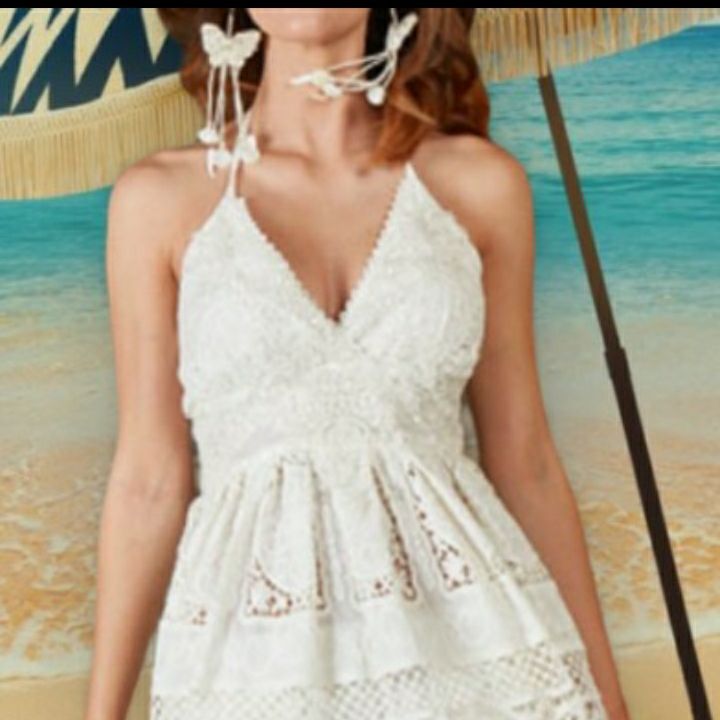 Vestido espalda aduera y corto.