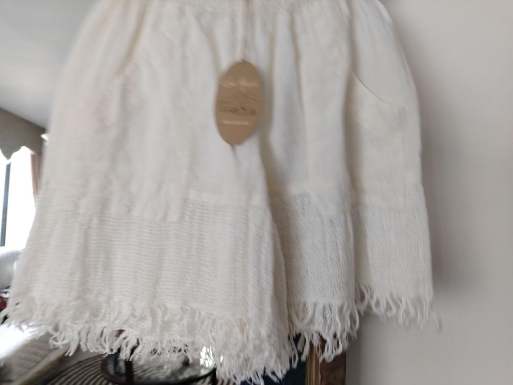 Short con flecos